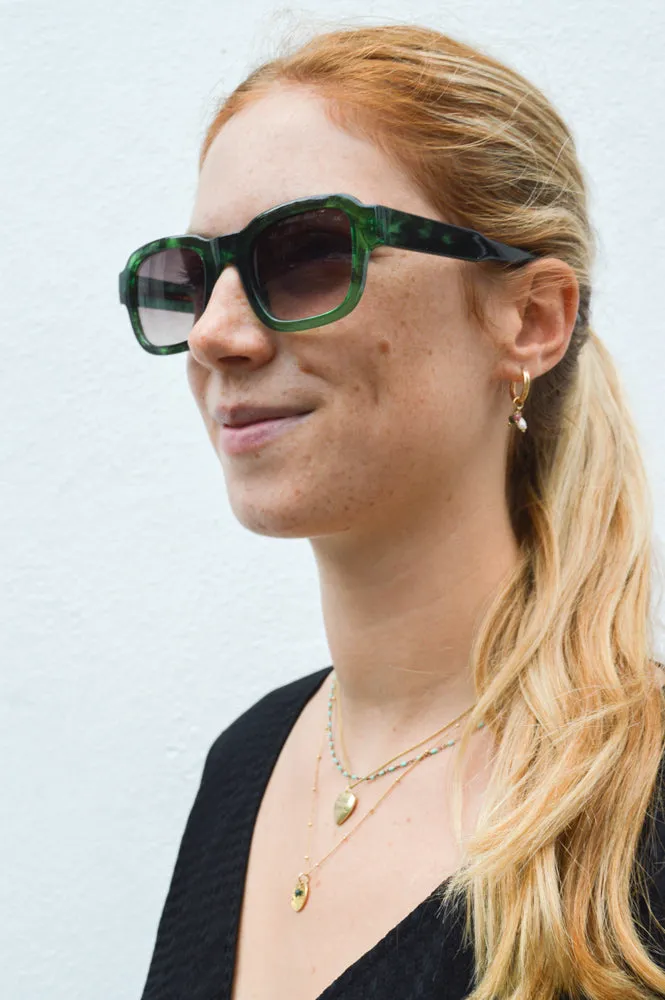 A Kjaerbede Halo Green Marble Transparent Sunglasses